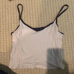 White tank trimmed with navy